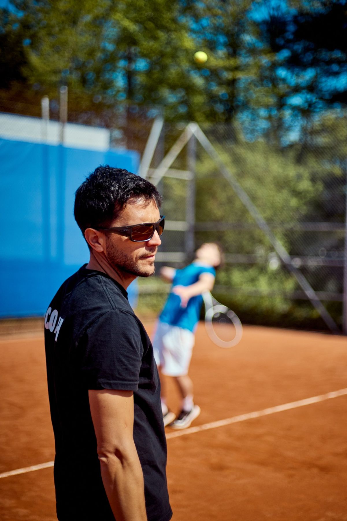Coach de Team Lausanne au bord du court